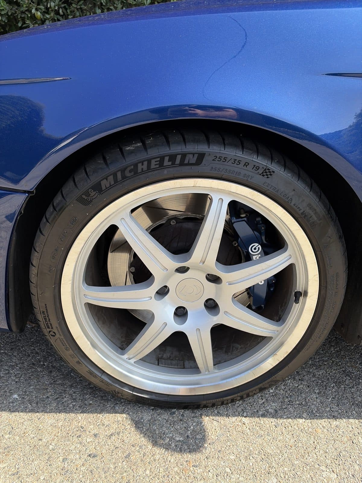 2003 BMW M5 pre-purchase inspection — wheel and tire tread photo