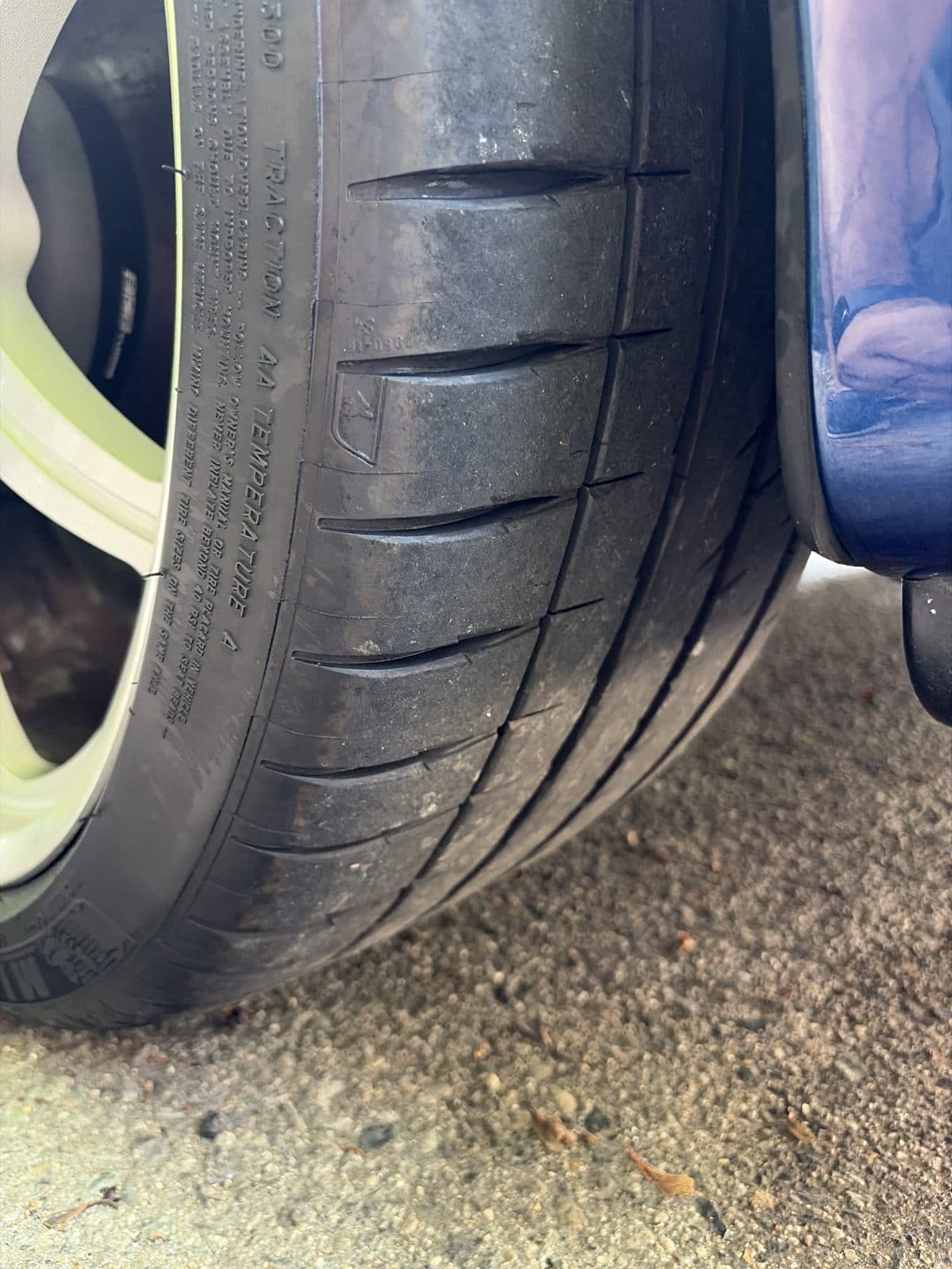 2003 BMW M5 pre-purchase inspection — wheel and tire tread photo