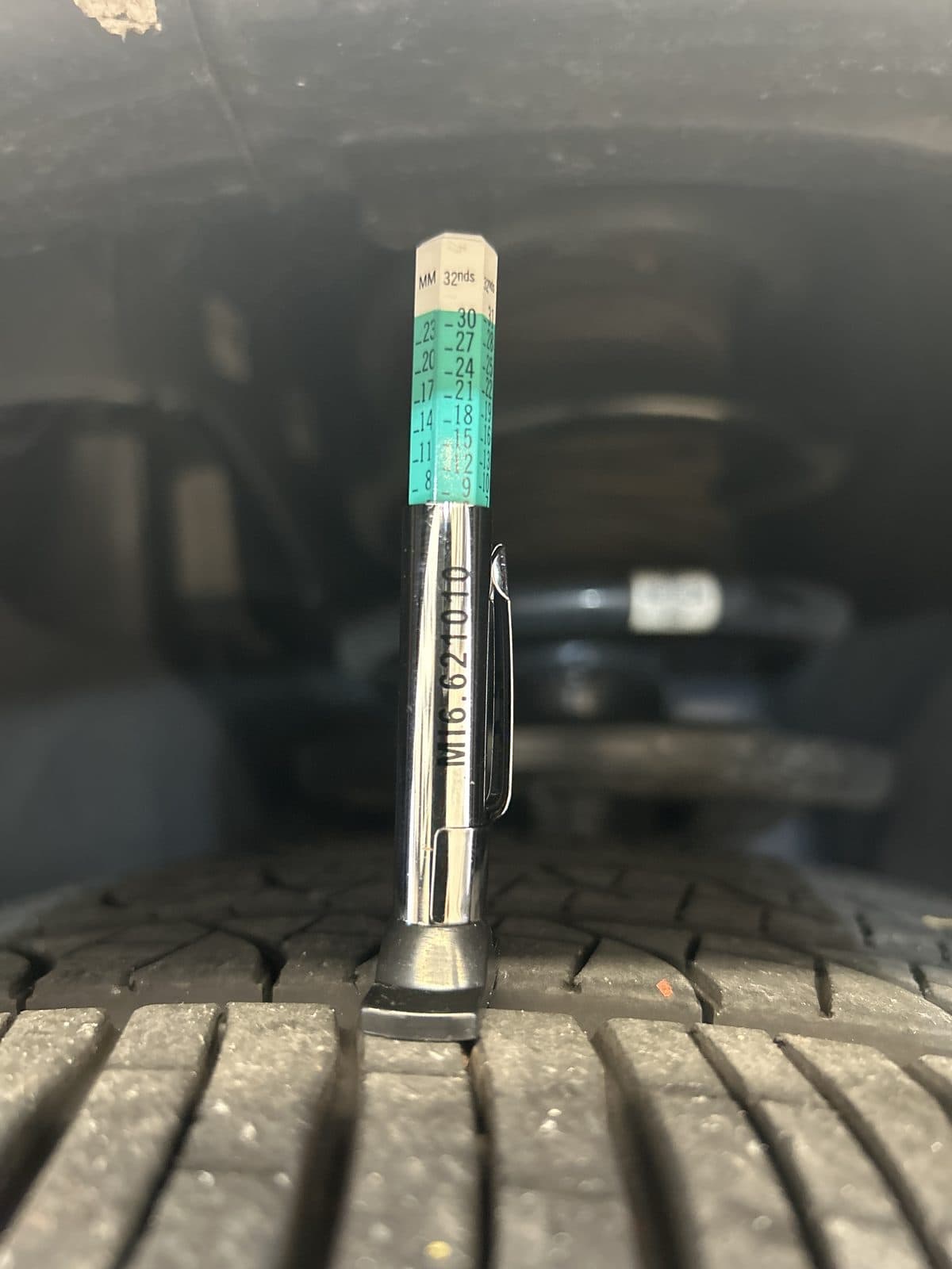 2026 BMW X3 M50 xDrive pre-purchase inspection — tire tread depth gauge photo